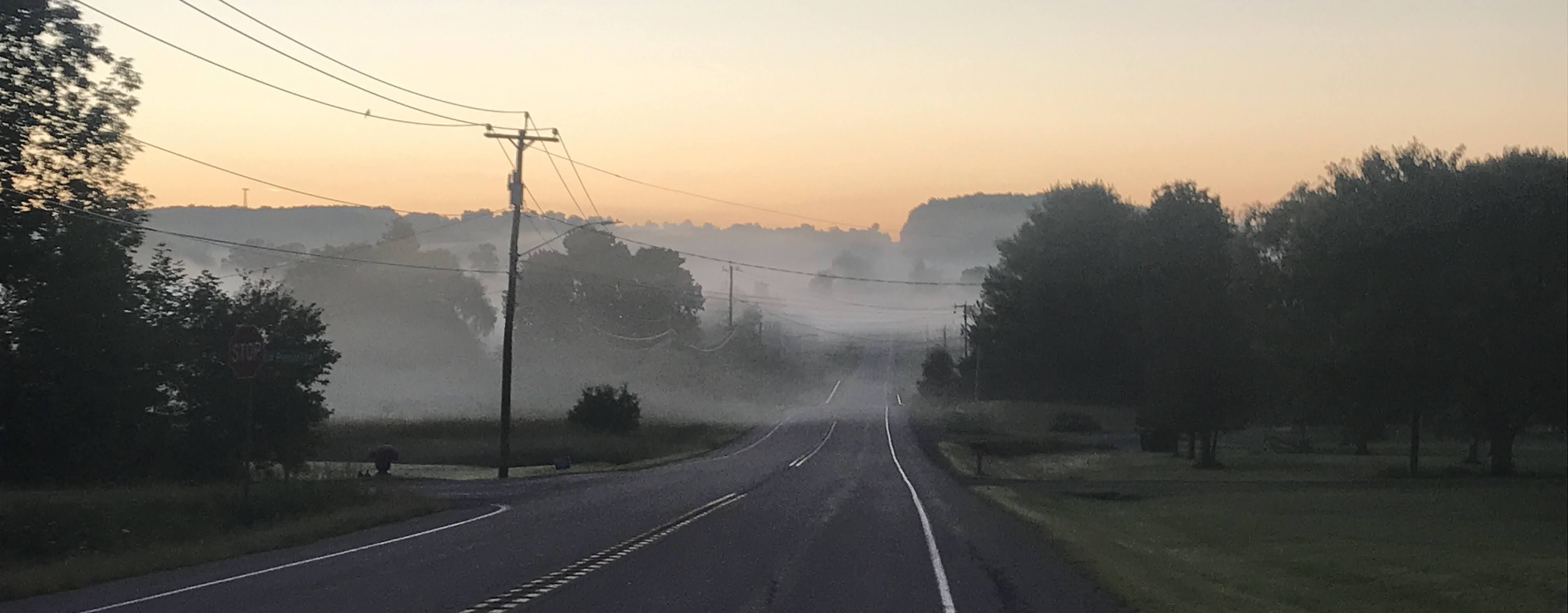 Smoke and fog trapped east of in Ithaca New York during a temperature inversion in October 2021